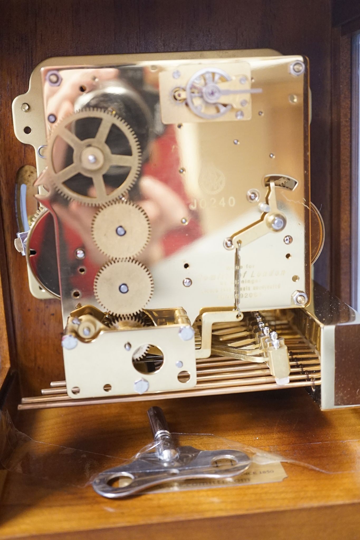 A George II style burr walnut striking and chiming eight day bracket clock, by Comitti, 32cm